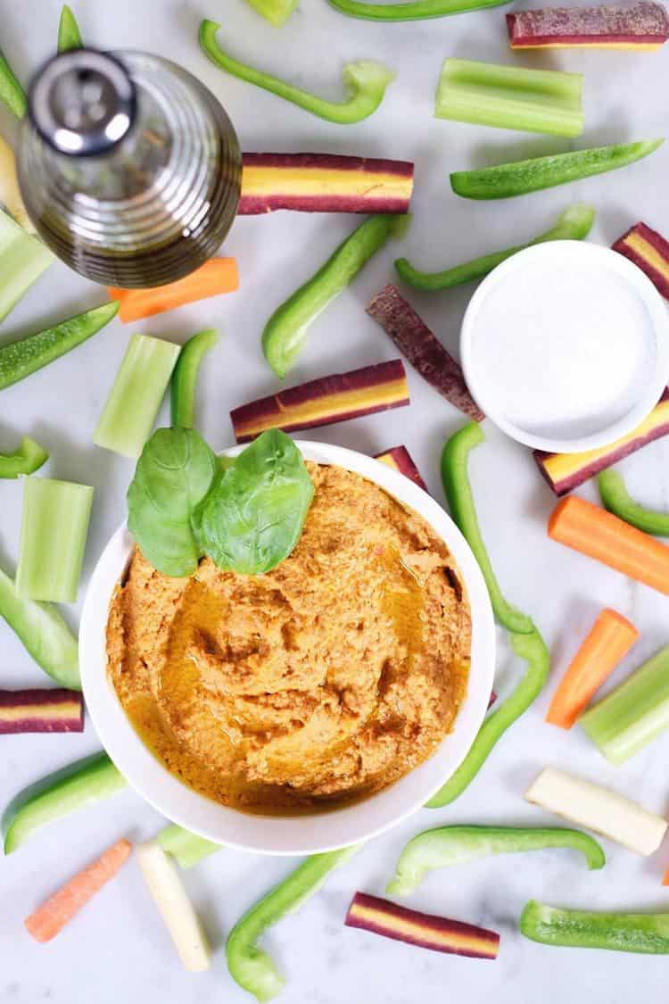 Invite some friends over, and make a batch of this garlic basil nut hummus! Get to dipping and enjoy a Paleo + Whole30 friendly version of a favorite snack! Paleo, Whole30 + Legume-Free.| realsimplegood.com