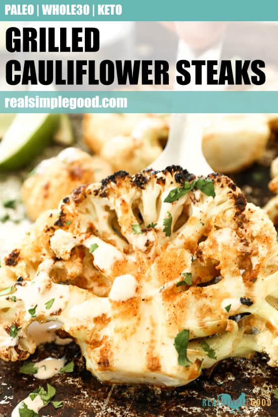 Close up of lifting cauliflower steak off pan with text overlay at top for pinterest. 