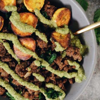 Ground beef and plantain bowls with green sauce on top