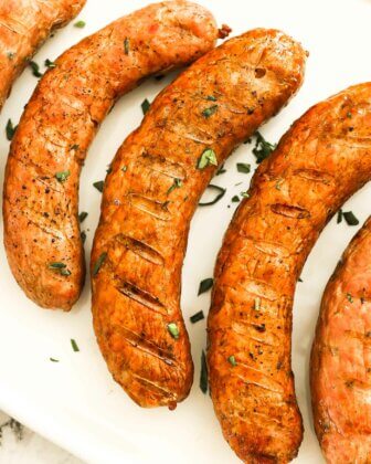 Close up overhead image of sausage links with grill marks