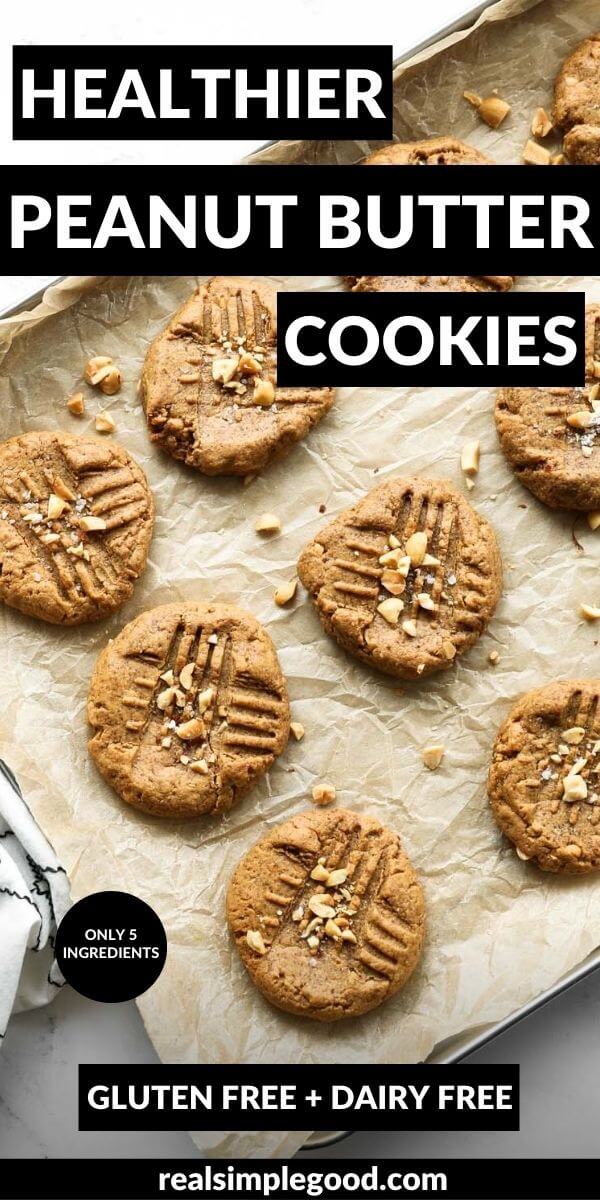 Vertical image of gluten free dairy free peanut butter cookies on a sheet pan with text overlay at the top and bottom.
