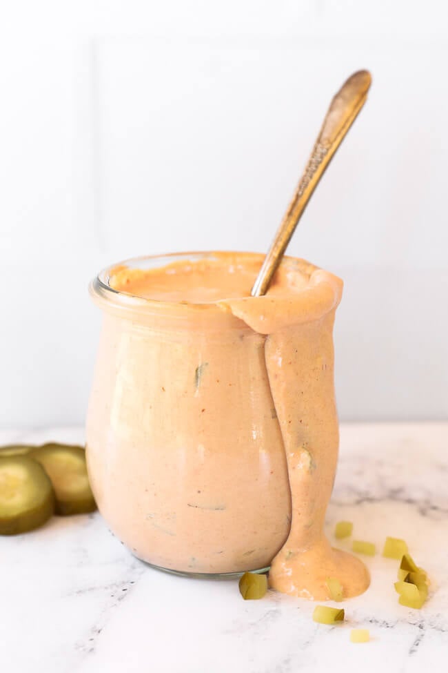Keto big mac sauce in a jar with spoon coming out
