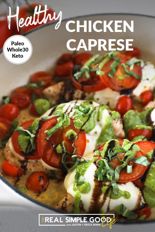 Vertical angled image of chicken caprese in skillet with text overlay at top. Chicken breasts topped with mozzarella cheese, tomatoes, pesto, balsamic and fresh basil. 