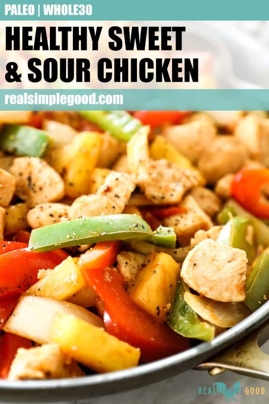Angled shot of healthy sweet and sour chicken in skillet with text at the top of the photo for pinterest. Dish includes chicken, onion, red and green bell pepper, pineapple and a sweet and sour sauce. 