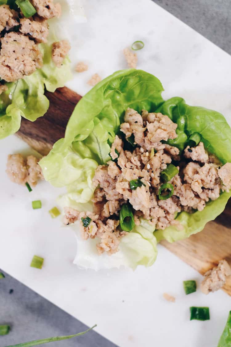 Simple, easy and quick dinners always end up being our favorite! These Healthy Teriyaki Chicken Lettuce Wraps are a total breeze to make and Paleo friendly!  Gluten-Free, Soy-Free + Refined Sugar-Free. | realsimplegood.com