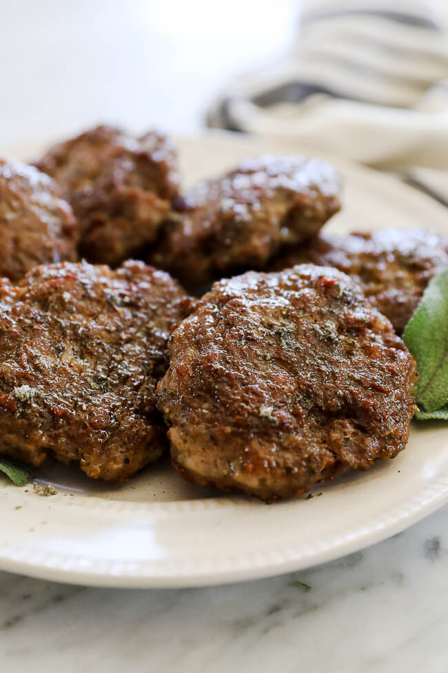 Homemade country breakfast sausage patties on a plate. 