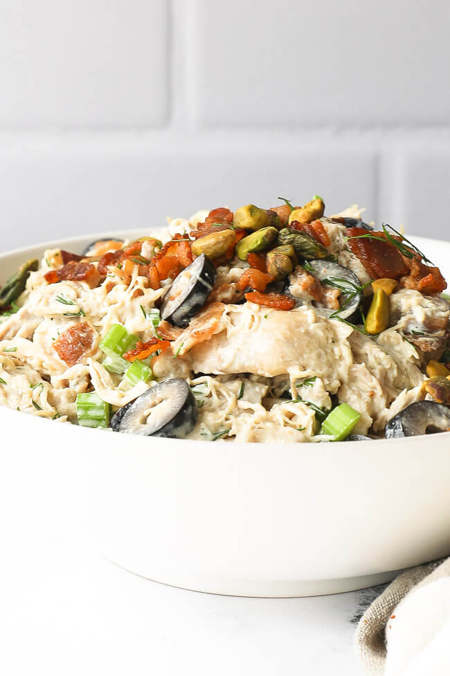 Angled vertical close up of keto chicken salad in a bowl. 