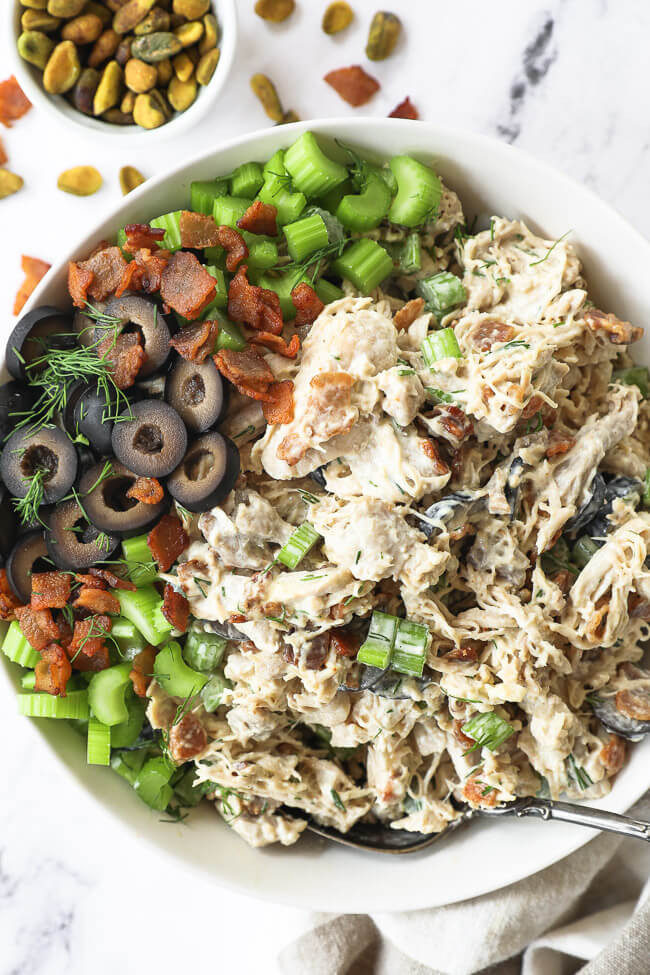 Overhead vertical close up image of keto chicken salad in a bowl. 