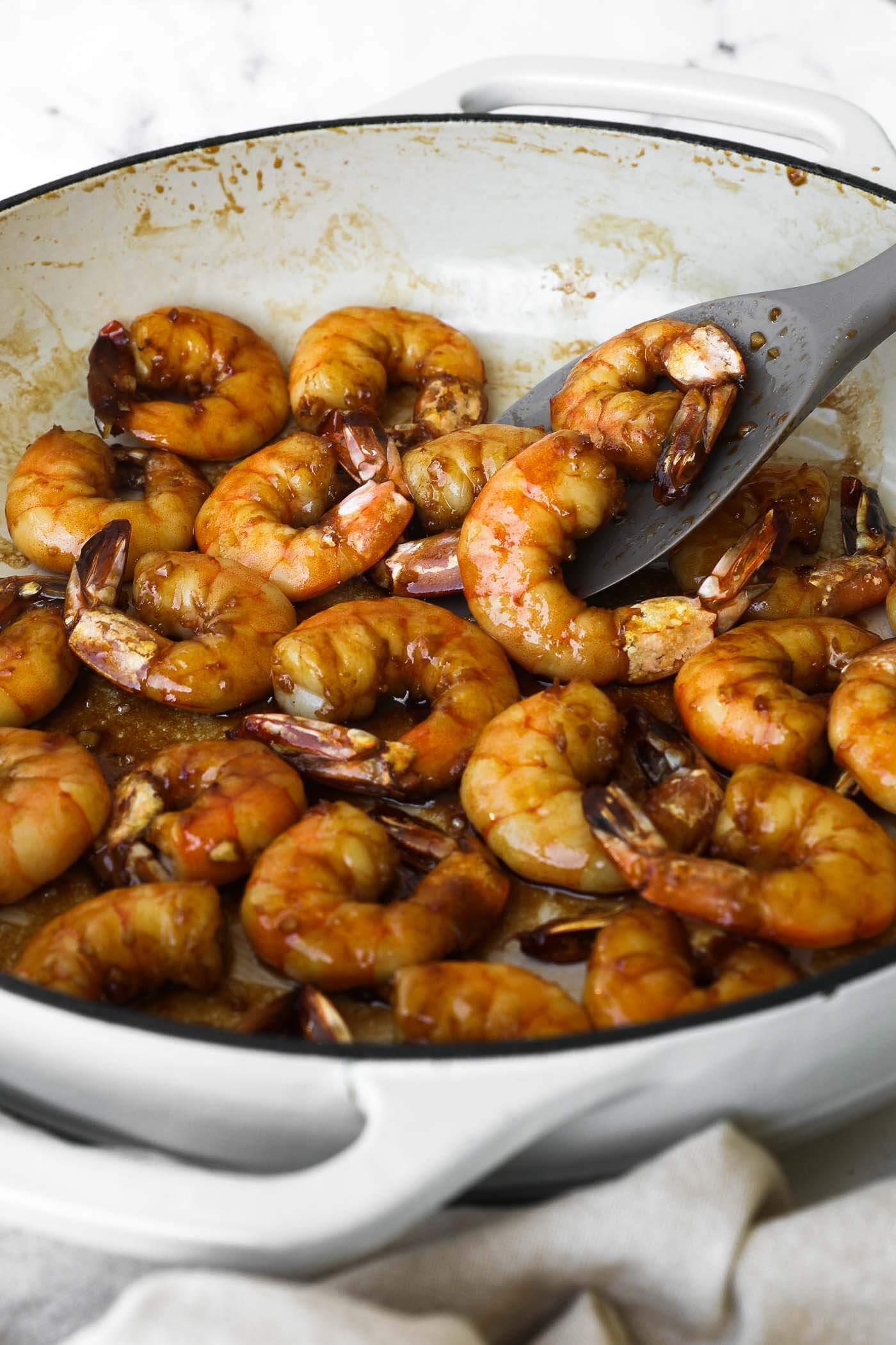 Close up angle image of cooked honey garlic pan fried shrimp.