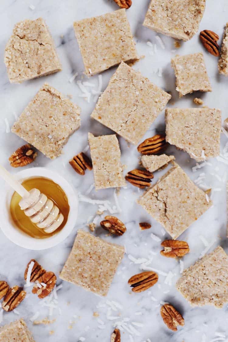 We like to whip up a batch of these no bake honey nut bars over the weekend, and then have them in the fridge for when a snack or treat sounds good! Paleo, Gluten-Free + Refined Sugar-Free. | realsimplegood.com