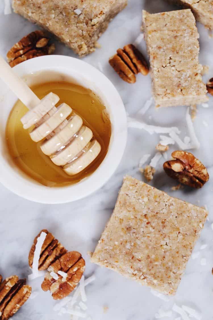 We like to whip up a batch of these no bake honey nut bars over the weekend, and then have them in the fridge for when a snack or treat sounds good! Paleo, Gluten-Free + Refined Sugar-Free. | realsimplegood.com
