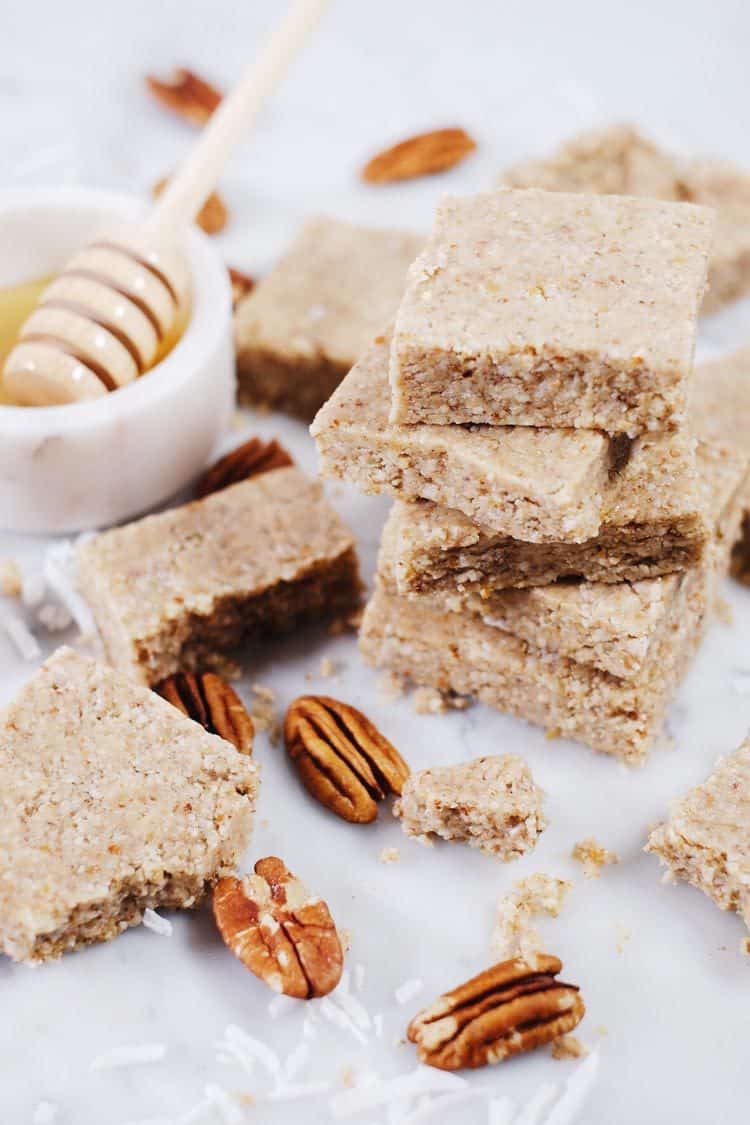 We like to whip up a batch of these no bake honey nut bars over the weekend, and then have them in the fridge for when a snack or treat sounds good! Paleo, Gluten-Free + Refined Sugar-Free. | realsimplegood.com