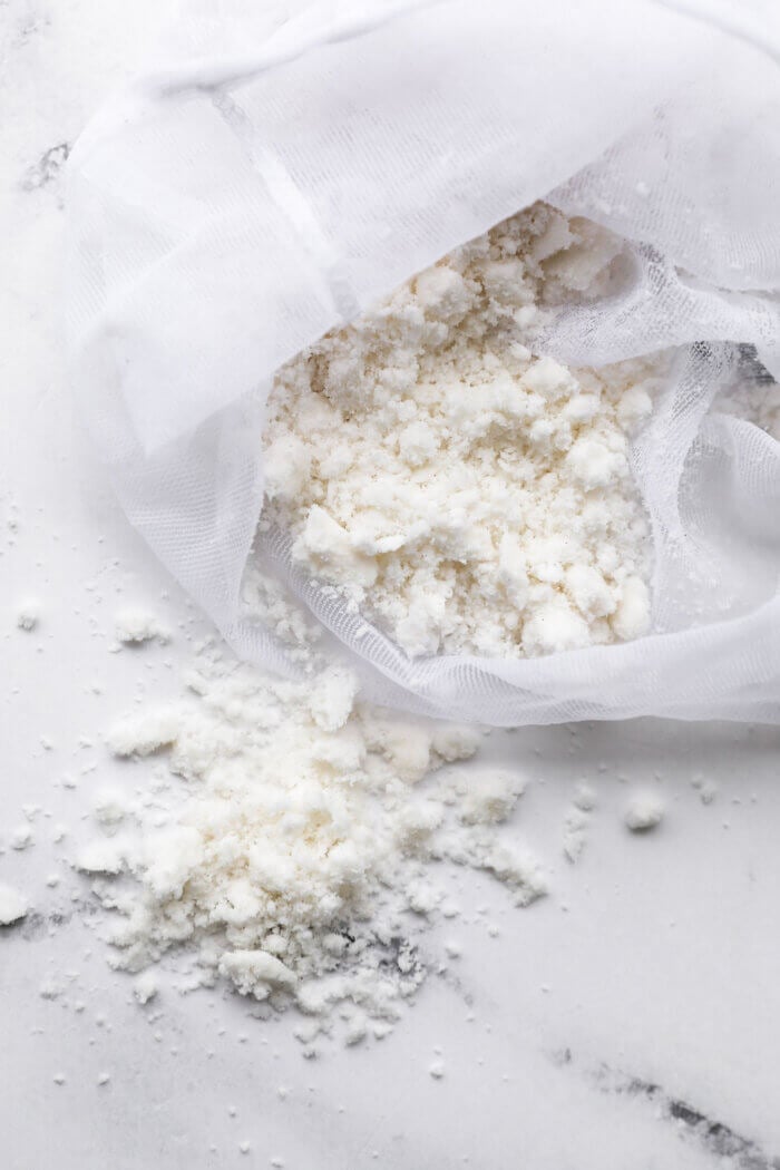 Overhead image of coconut pulp from nut milk bag after straining the milk.