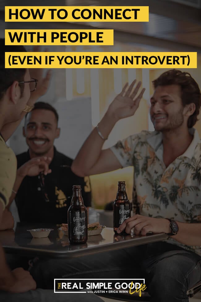 Men at table with beer. Text overlay of "how to connect with people, even if you're an introvert"