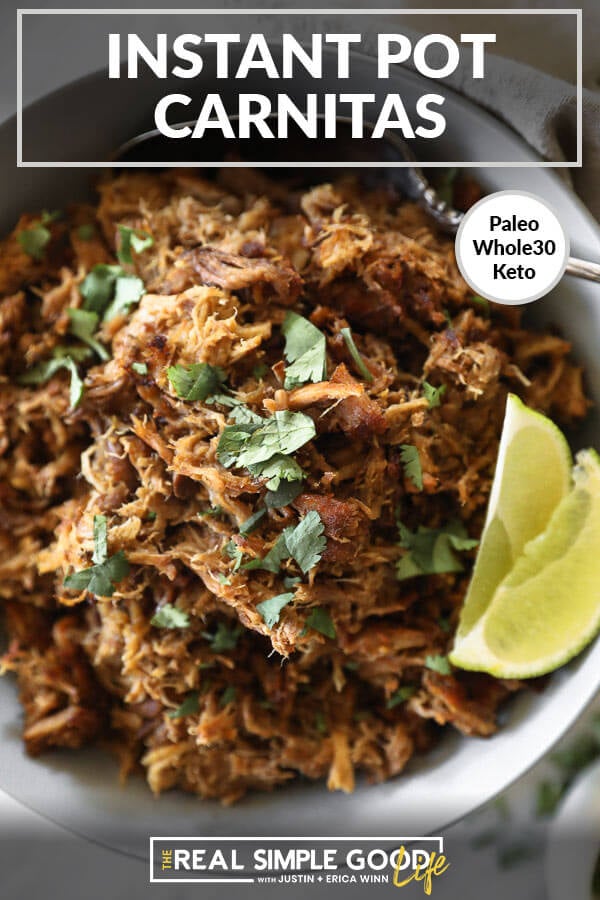 Instant pot carnitas in bowl with lime wedges and cilantro overhead vertical close up image with text at top