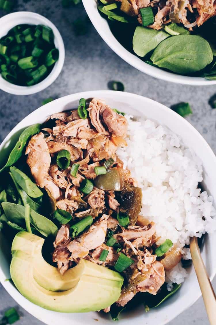 For this southwest chicken and rice, we've used a base of greens (just whatever greens you love and have on hand), white or cauliflower rice and the chicken mixture with some extra saucy goodness spooned on top. We added some healthy fats with a little avocado and sprinkled chopped green onion on there. #paleo #whole30 #instantpot | realsimplegood.com
