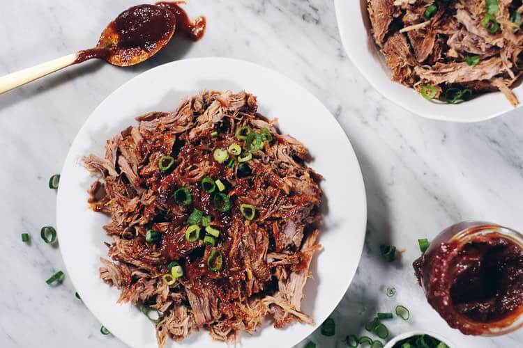 This Instant Pot Whole30 Pulled Pork with BBQ Sauce is the perfect way to utilize your Instant Pot! Also, we made the yummiest Whole30 friendly BBQ Sauce! | realsimplegood.com