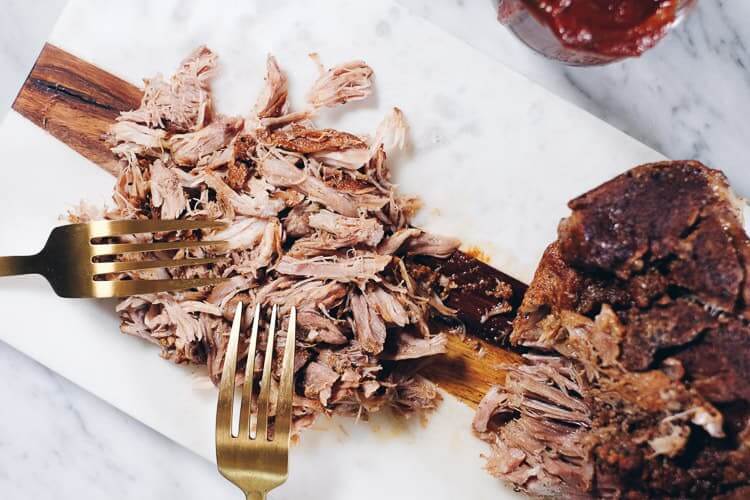 This Instant Pot Whole30 Pulled Pork with BBQ Sauce is the perfect way to utilize your Instant Pot! Also, we made the yummiest Whole30 friendly BBQ Sauce! | realsimplegood.com