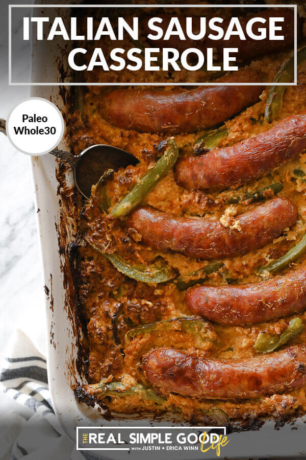 Sausages and bell peppers in a casserole dish over creamy cauliflower with text at top of "italian sausage casserole"
