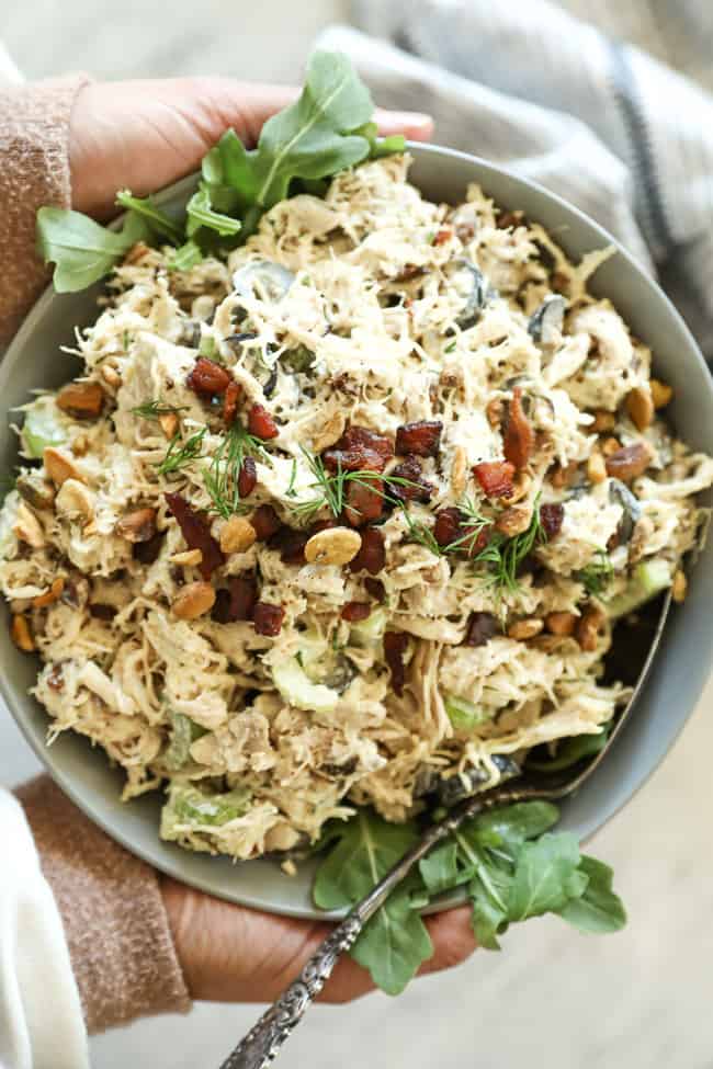 Keto chicken salad in a bowl with bacon bits