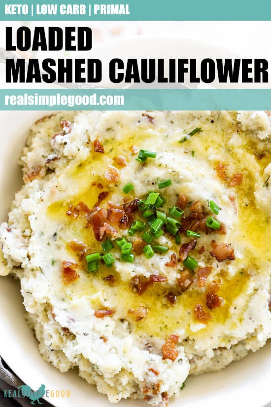 Vertical overhead close up image of loaded mashed cauliflower in a bowl with text overlay at the top. 