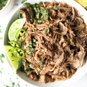 Close up overhead image of mojo pulled pork in a bowl