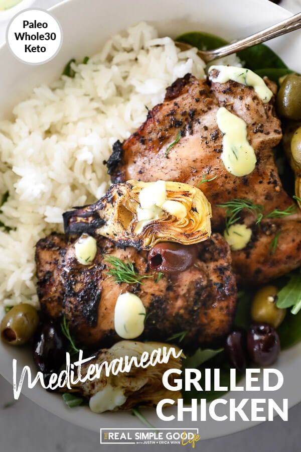 Overhead close up image of grilled mediterranean chicken in a bowl with rice, artichoke hearts and olives. Text overlay at bottom. 