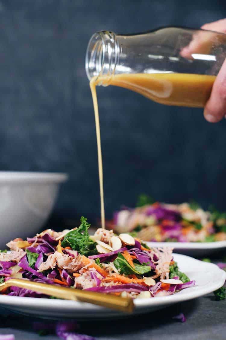 One of my favorite salads to make ahead of time and enjoy the leftovers for lunch is this Whole30 and Paleo Chinese chicken salad. It's packed with colorful veggies (cabbage, carrots, kale, onions and celery) plus easy shredded chicken and a simple dressing. Paleo + Whole30 | realsimplegood.com