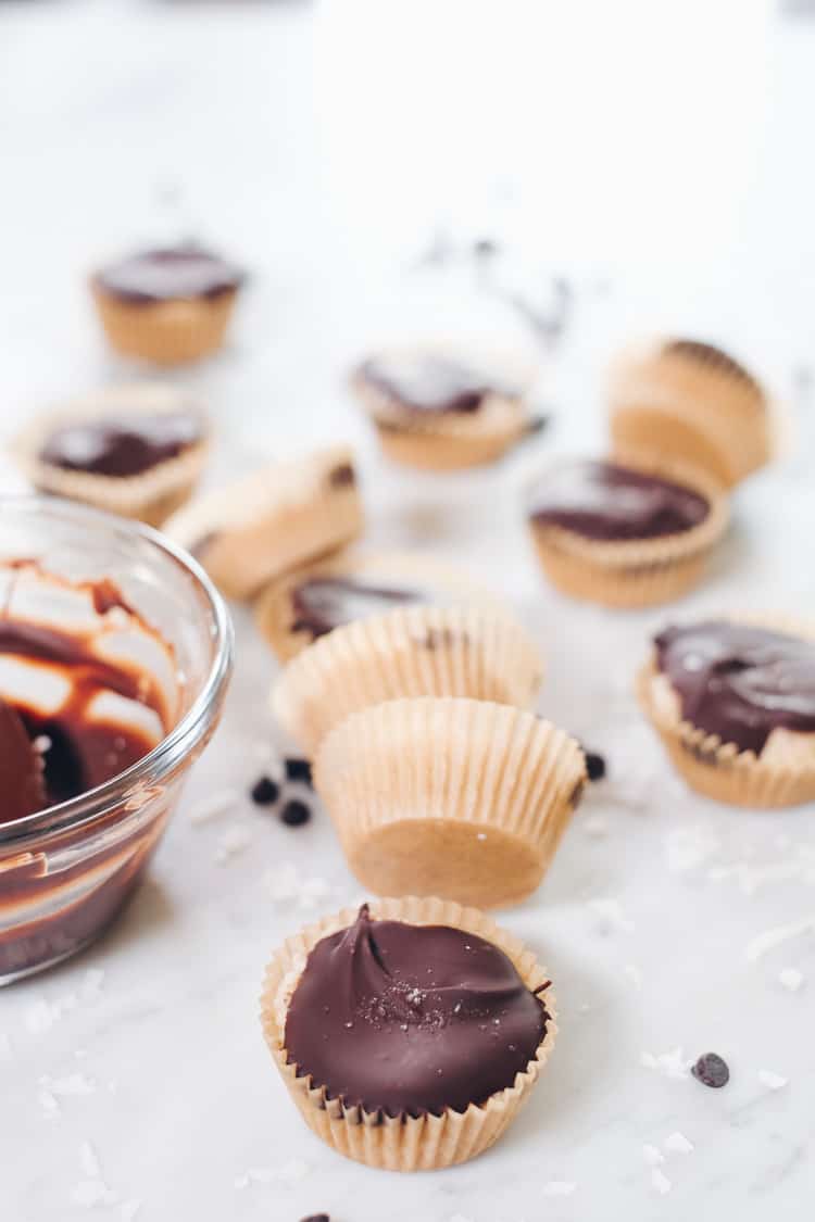 These Paleo coconut butter cups are my latest salty-sweet creation that I've made into the perfect two-bite sized treat! They're gluten-free and dairy-free! | realsimplegood.com