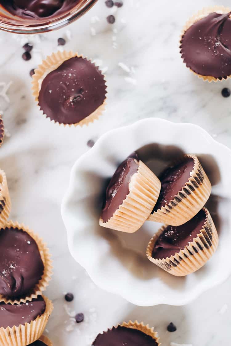 These Paleo coconut butter cups are my latest salty-sweet creation that I've made into the perfect two-bite sized treat! They're gluten-free and dairy-free! | realsimplegood.com