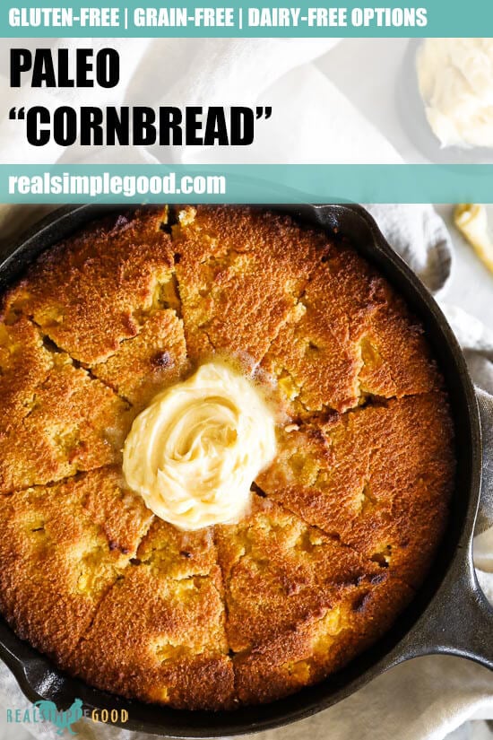 Close up image of paleo cornbread in a skillet with honey butter on top and text overlay at top. 