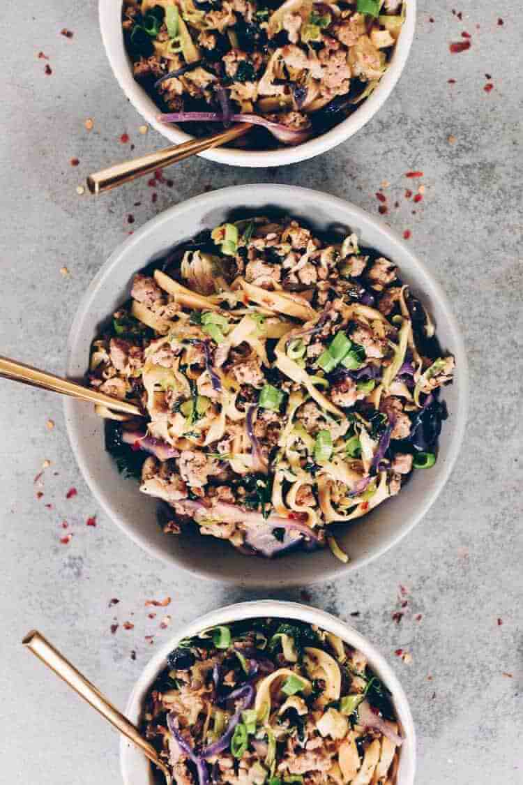 These Paleo potsticker noodle bowls are the BEST! Filled with cruciferous veggies, grain-free pasta and deliciously seasoned ground pork! Paleo, Gluten-Free, Dairy-Free + Soy-Free. | realsimplegood.com