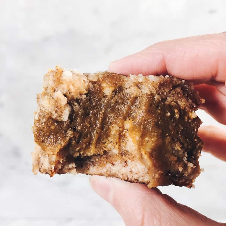 These delicious Paleo pumpkin bars are filled with all the fall flavors you're craving without dairy, gluten, eggs or refined sugar! | realsimplegood.com