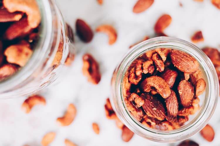 These Paleo spiced nuts are a great way to add extra flavor to your day! They are super simple and easy to make and obviously crazy addicting! Whole30 too! #paleo #whole30 #holidays #mixednuts #spicednuts | realsimplegood.com