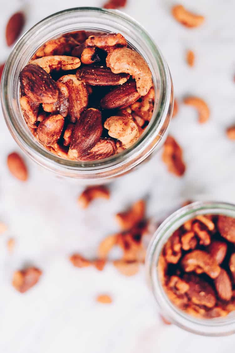These Paleo spiced nuts are a great way to add extra flavor to your day! They are super simple and easy to make and obviously crazy addicting! Whole30 too! #paleo #whole30 #holidays #mixednuts #spicednuts | realsimplegood.com