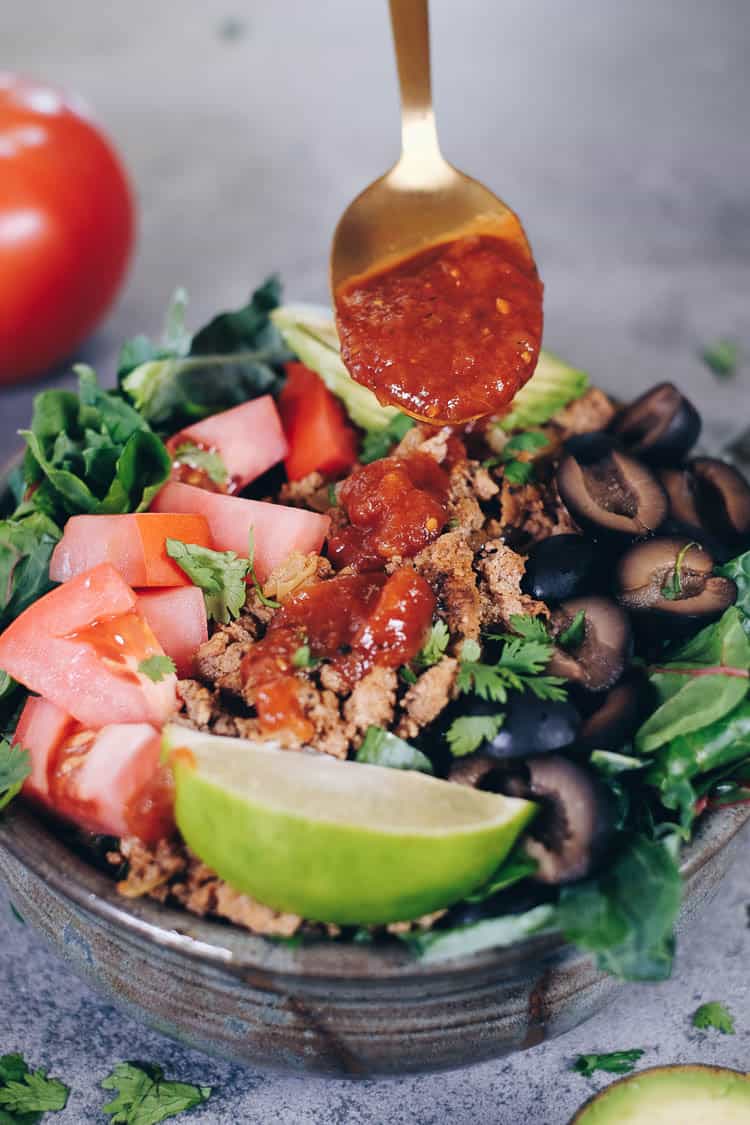 I really love taco everything, and this quick and easy Whole30 and Paleo taco salad is a bowl full of goodness I could eat anytime of day! Paleo, Whole30 + Gluten-Free. | realsimplegood.com