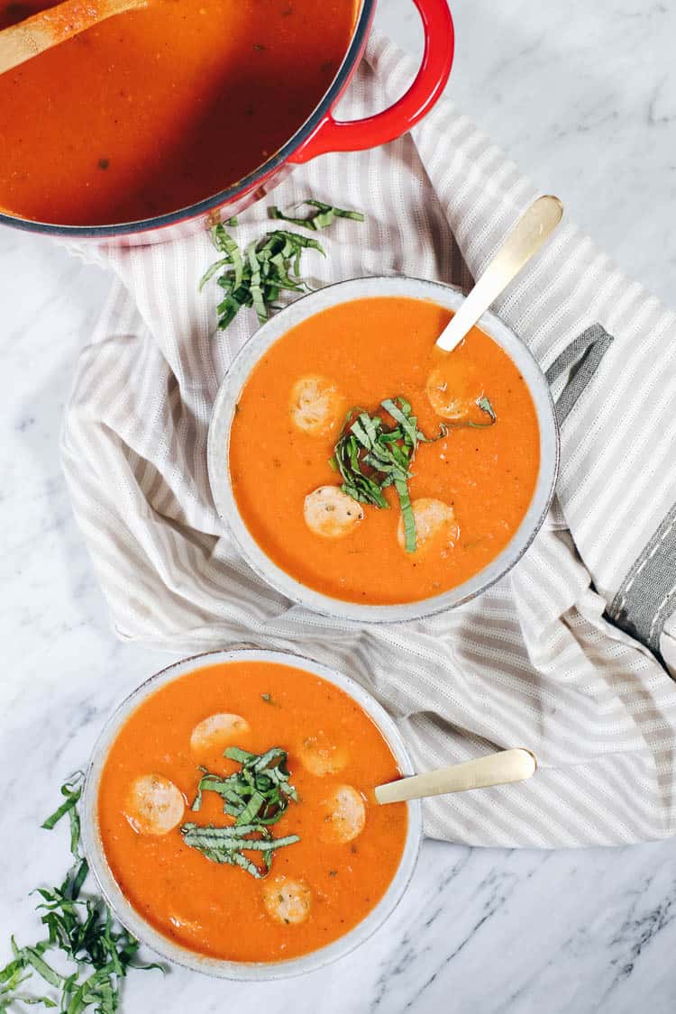 This Whole30 Paleo tomato basil soup with sausage is a bit of a spicier twist on traditional tomato soup with added protein and is quick and easy to make! #paleo #dairyfree #whole30 #recipe | realsimplegood.com