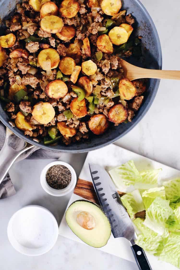 Pork + Plantains go together perfectly and with few ingredients this dish packs flavor! This Paleo + Whole30 pork and plantain bowl is simple and delicious. Paleo, Whole30, Gluten-Free + Dairy-Free. | realsimplegood.com