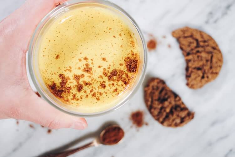This dairy-free Pumpkin Turmeric Latte is the perfect caffeine-free beverage to snuggle up with over the holidays It's got all your favorite fall flavors! Paleo, Vegan + Refined Sugar-Free. | realsimplegood.com