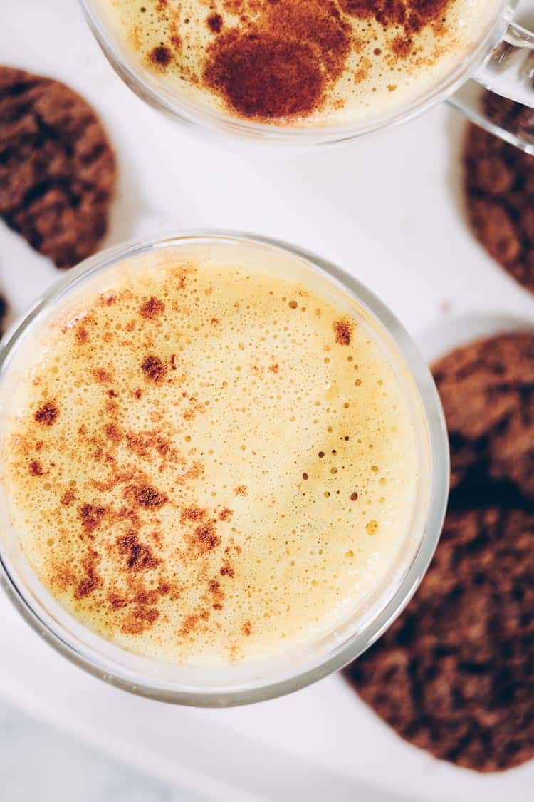 This dairy-free Pumpkin Turmeric Latte is the perfect caffeine-free beverage to snuggle up with over the holidays It's got all your favorite fall flavors! Paleo, Vegan + Refined Sugar-Free. | realsimplegood.com