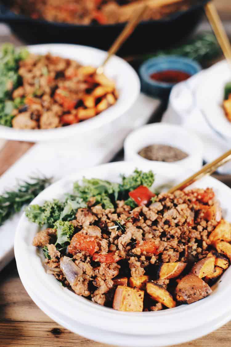 Make-ahead breakfasts are a life-saver during the work week for Whole30 + Paleo. This rosemary, sausage and sweet potato hash is perfect for re-heating! Paleo, Gluten-Free + Whole30. | realsimplegood.com