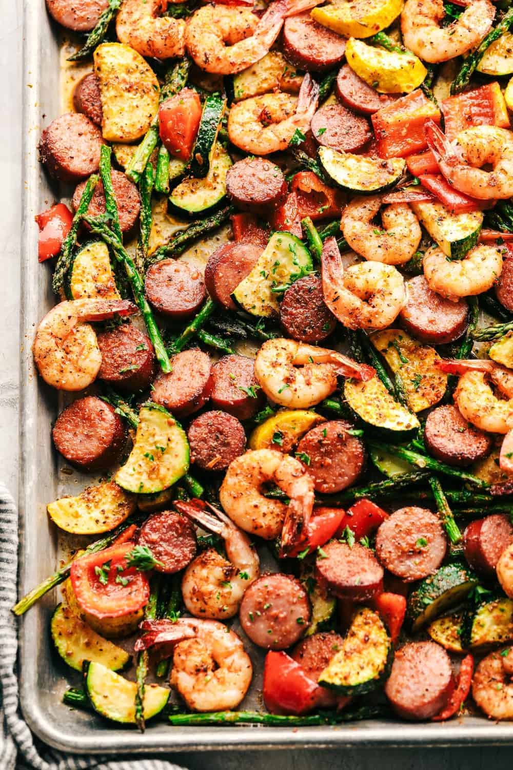 Cajun shrimp and sausage with veggies on a sheet pan