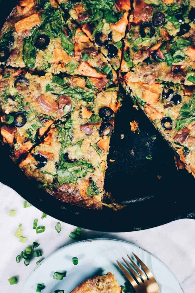 This Paleo + Whole30 sausage and sweet potato frittata is filling and full of the delicious flavors of sausage, sweet potatoes, olives and green onions. It will keep you going all morning! #paleo #whole30 #glutenfree #dairyfree #breakfast | realsimplegood.com