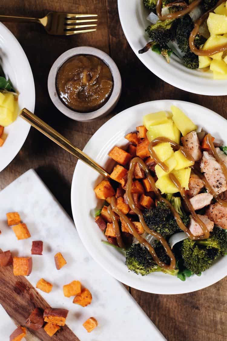 Go ahead and make these delicious sheet pan chicken buddha bowls! The perfect Paleo + Whole30 meal for making ahead of time for leftovers! Chicken, broccoli, sweet potato, mango, onion and tahini sauce. Paleo + Whole30. | realsimplegood.com