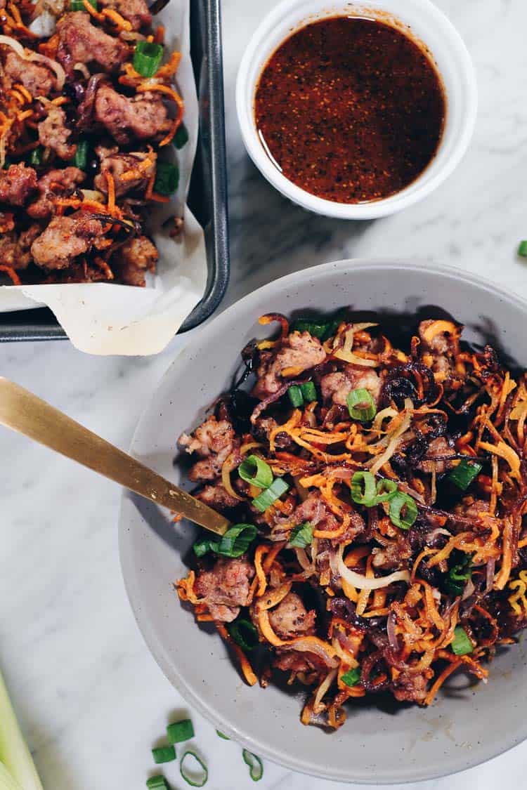 Enjoy the delicious flavors and textures of this Paleo and Whole30 Sheet Pan Crispy Vegetable Noodles and Pork recipe! You will crave the leftovers! | realsimplegood.com