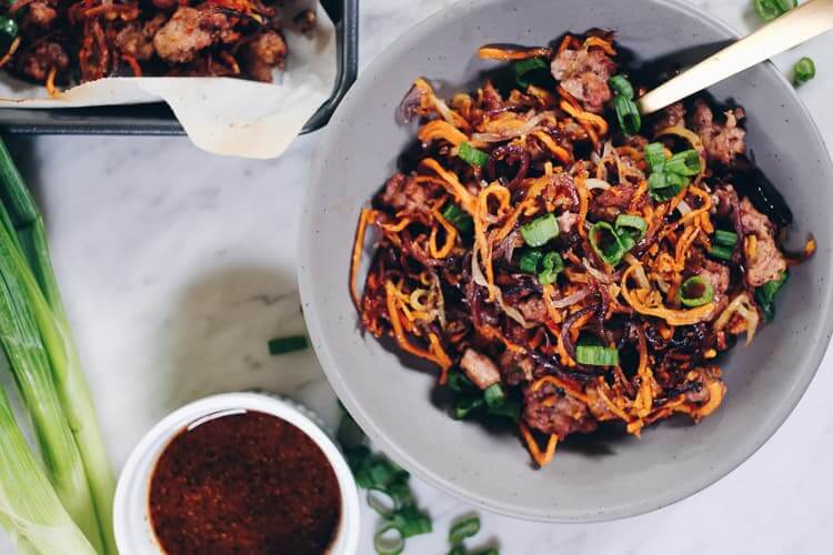 Enjoy the delicious flavors and textures of this Paleo and Whole30 Sheet Pan Crispy Vegetable Noodles and Pork recipe! You will crave the leftovers! | realsimplegood.com
