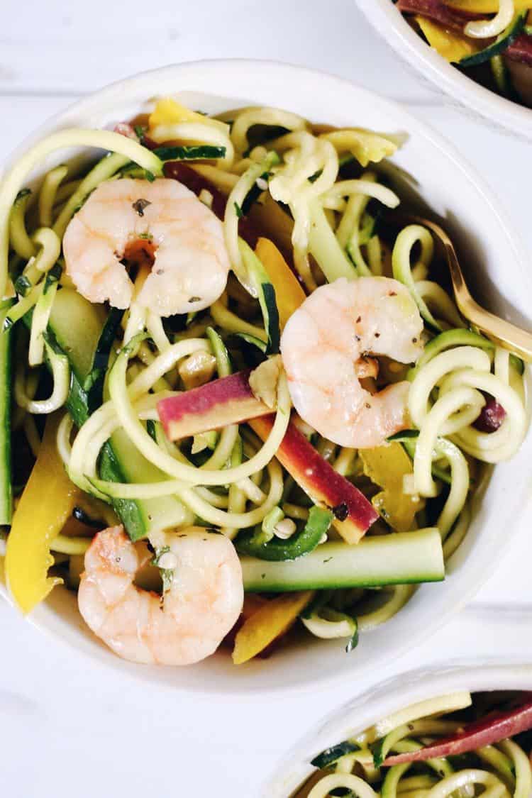 This shrimp zoodle spring roll bowl is packed with fresh and vibrant flavors and colors! It's light and refreshing, yet satisfying at the same time! Paleo, Whole30, Gluten-Free, Soy-Free + Dairy-Free. | realsimplegood.com