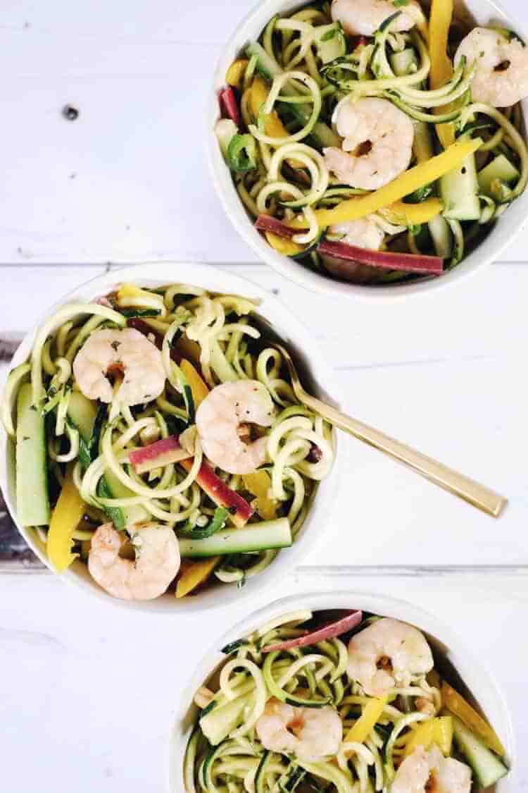 This shrimp zoodle spring roll bowl is packed with fresh and vibrant flavors and colors! It's light and refreshing, yet satisfying at the same time! Paleo, Whole30, Gluten-Free, Soy-Free + Dairy-Free. | realsimplegood.com