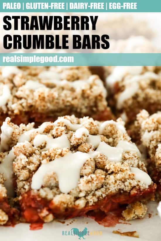 Close up image of strawberry crumble bars lined up on marble with text at the top for pinterest pin. 