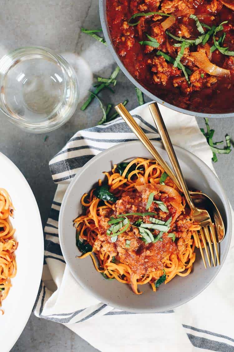 This Paleo and Whole30 sweet potato spaghetti is a nourishing and healthy way to enjoy spaghetti, with extra veggies and greens added in! | realsimplegood.com